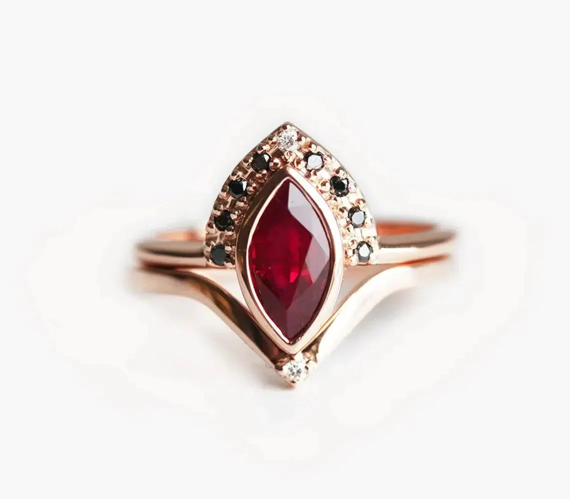 Pure crystal engagement rings-Regina Ruby And Black Diamond Ring Set With Chevron Band